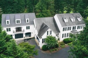Aerial view of House surrounded by greenery