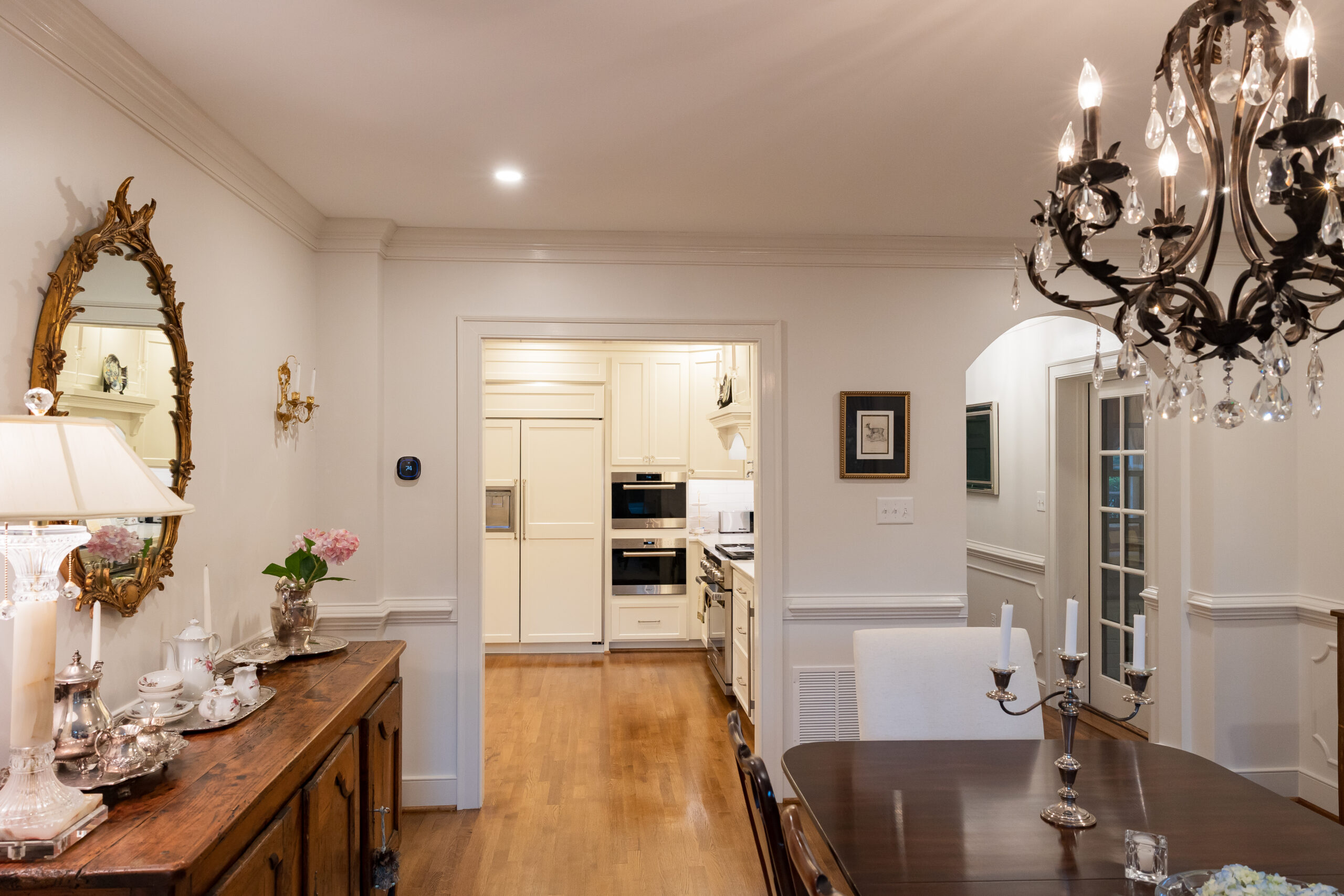 Dinning room addition with chandelier and bay window